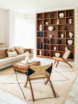 Sourcing, custom pieces, and the final layer of objects and textiles that make a finished room feel lived-in.